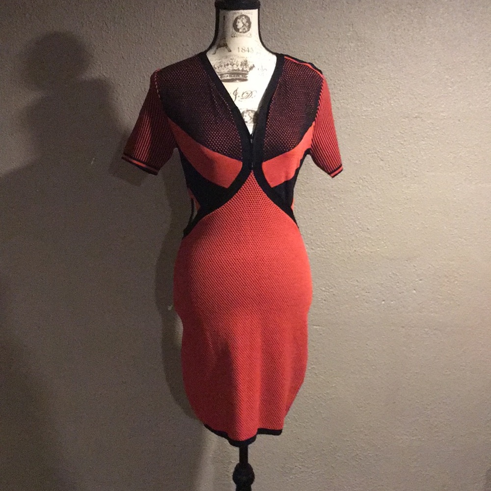 Sexy fitted dress with the side peek a boo opening